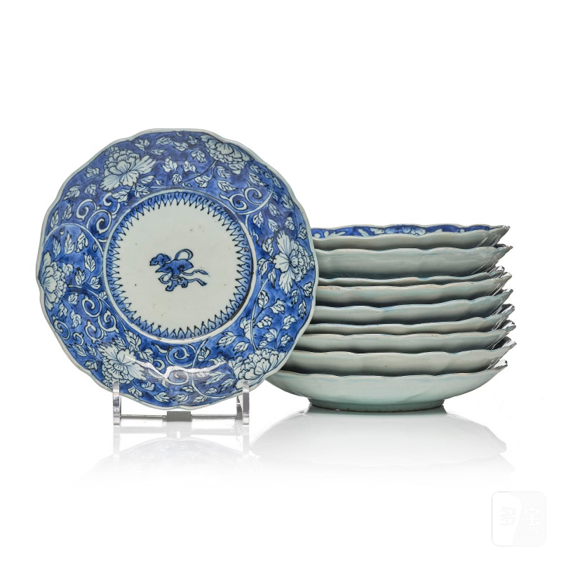 A set of 10 blue and white dishes,